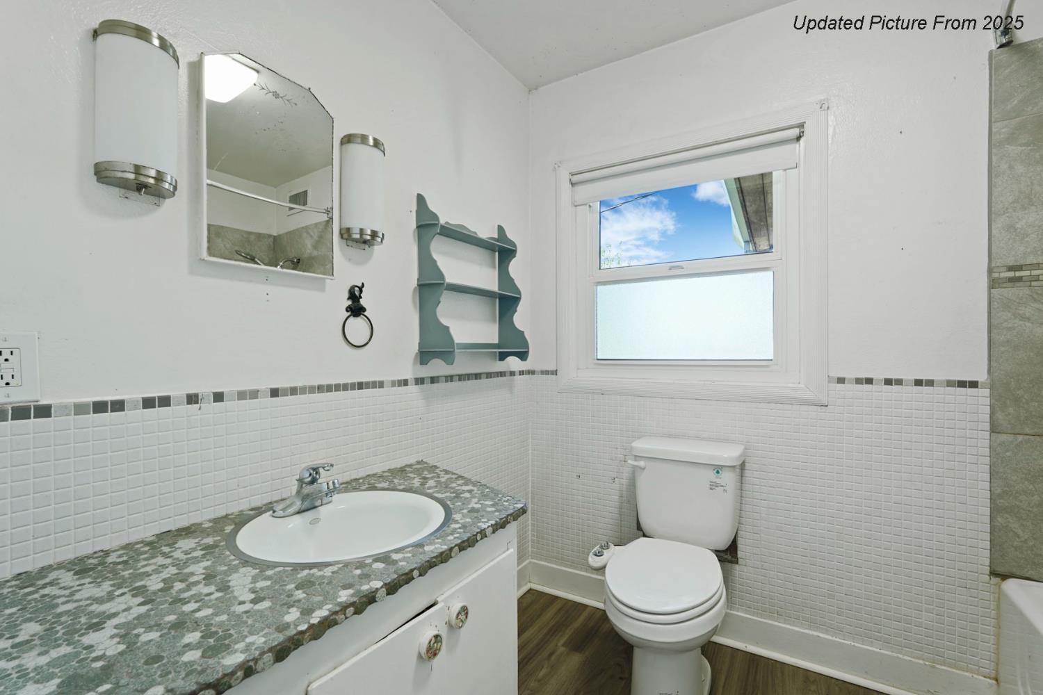 39670 South River Road Clarksburg, CA 95612 - Photo 74 of 85 a bathroom with a granite countertop toilet sink and mirror