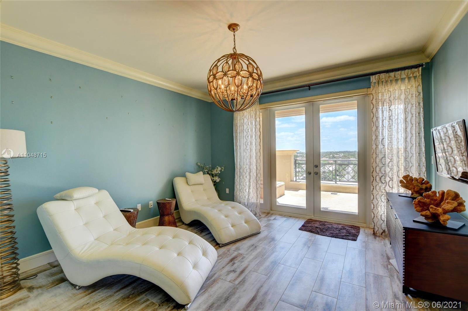 2500 South Ocean Boulevard, Unit 702 Boca Raton, FL 33432 - Photo 15 of 61 a living room with furniture and a large window
