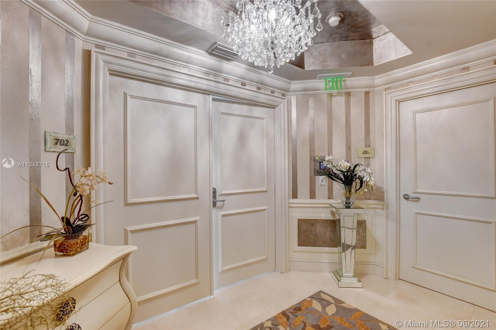 2500 South Ocean Boulevard, Unit 702 Boca Raton, FL 33432 - Photo 5 of 61 a view of a livingroom with furniture and a window