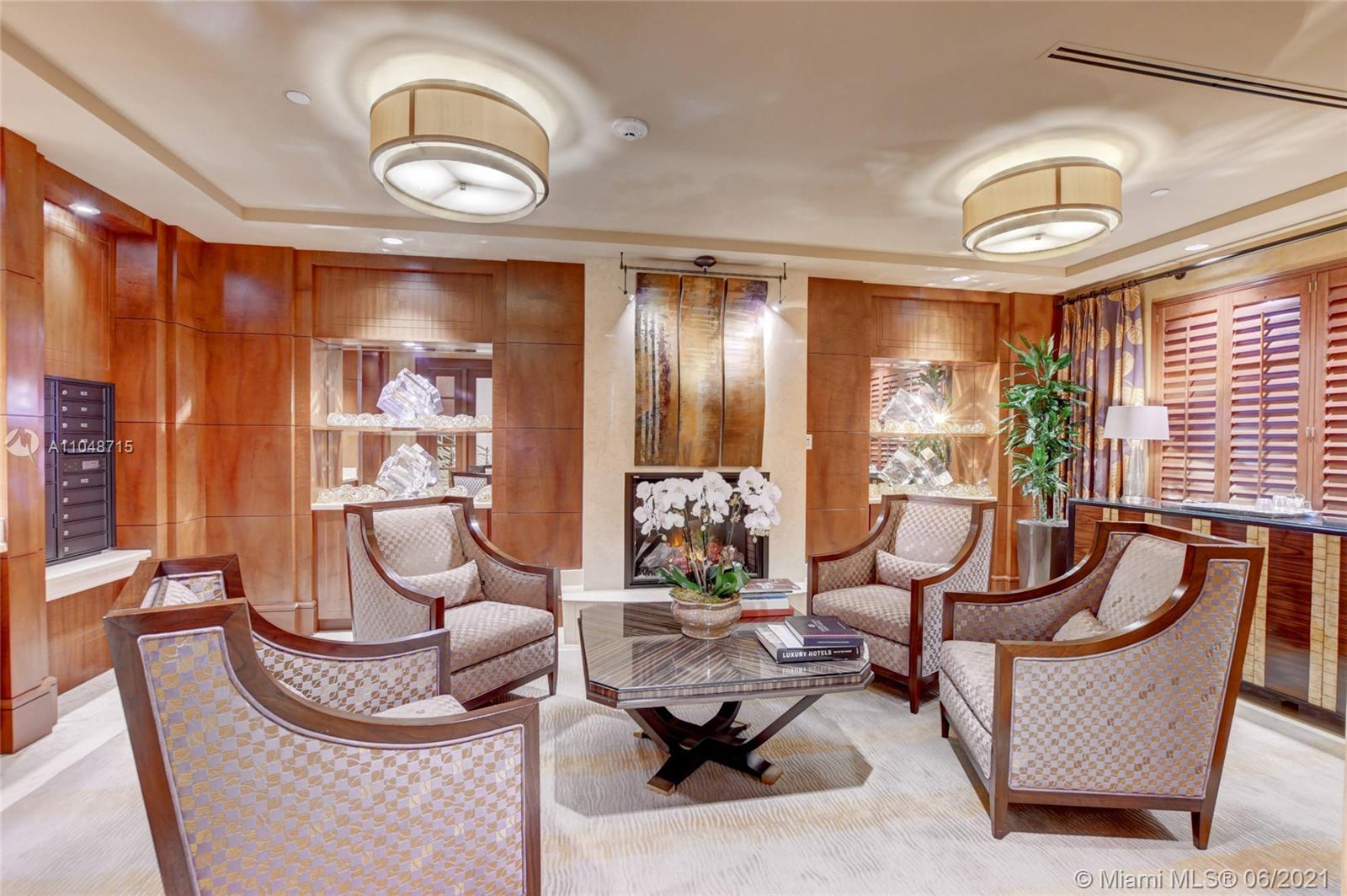 2500 South Ocean Boulevard, Unit 702 Boca Raton, FL 33432 - Photo 45 of 61 a living room with furniture and a large window