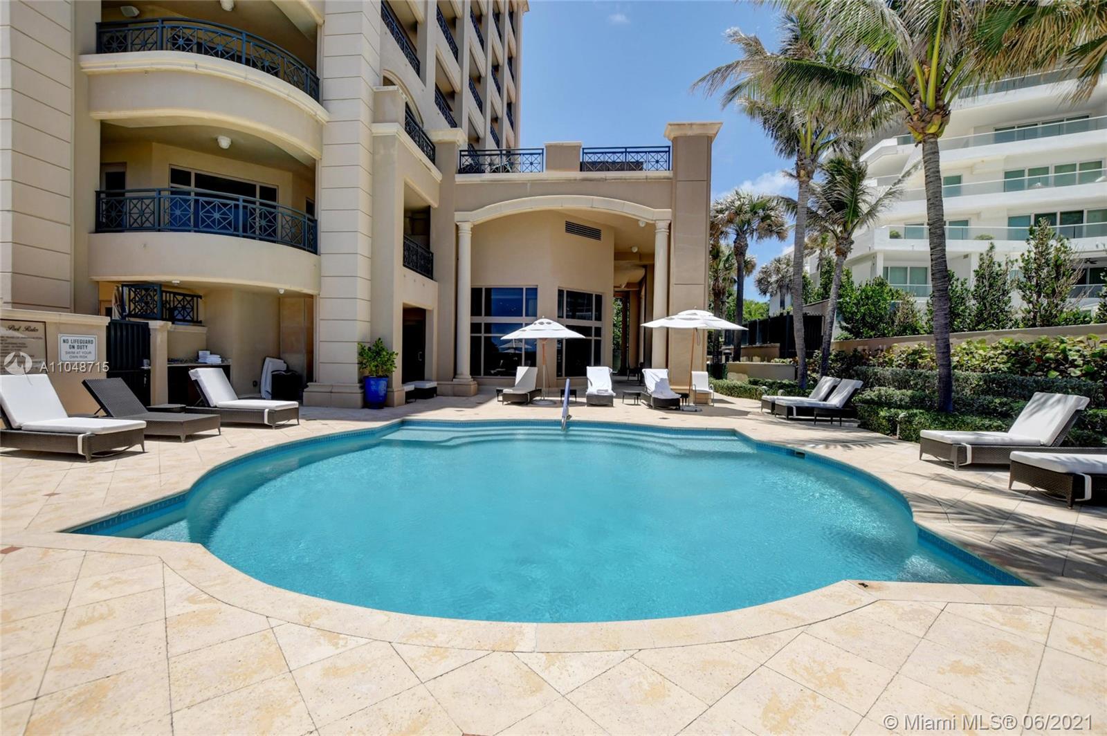 2500 South Ocean Boulevard, Unit 702 Boca Raton, FL 33432 - Photo 57 of 61 a view of a swimming pool with outdoor seating