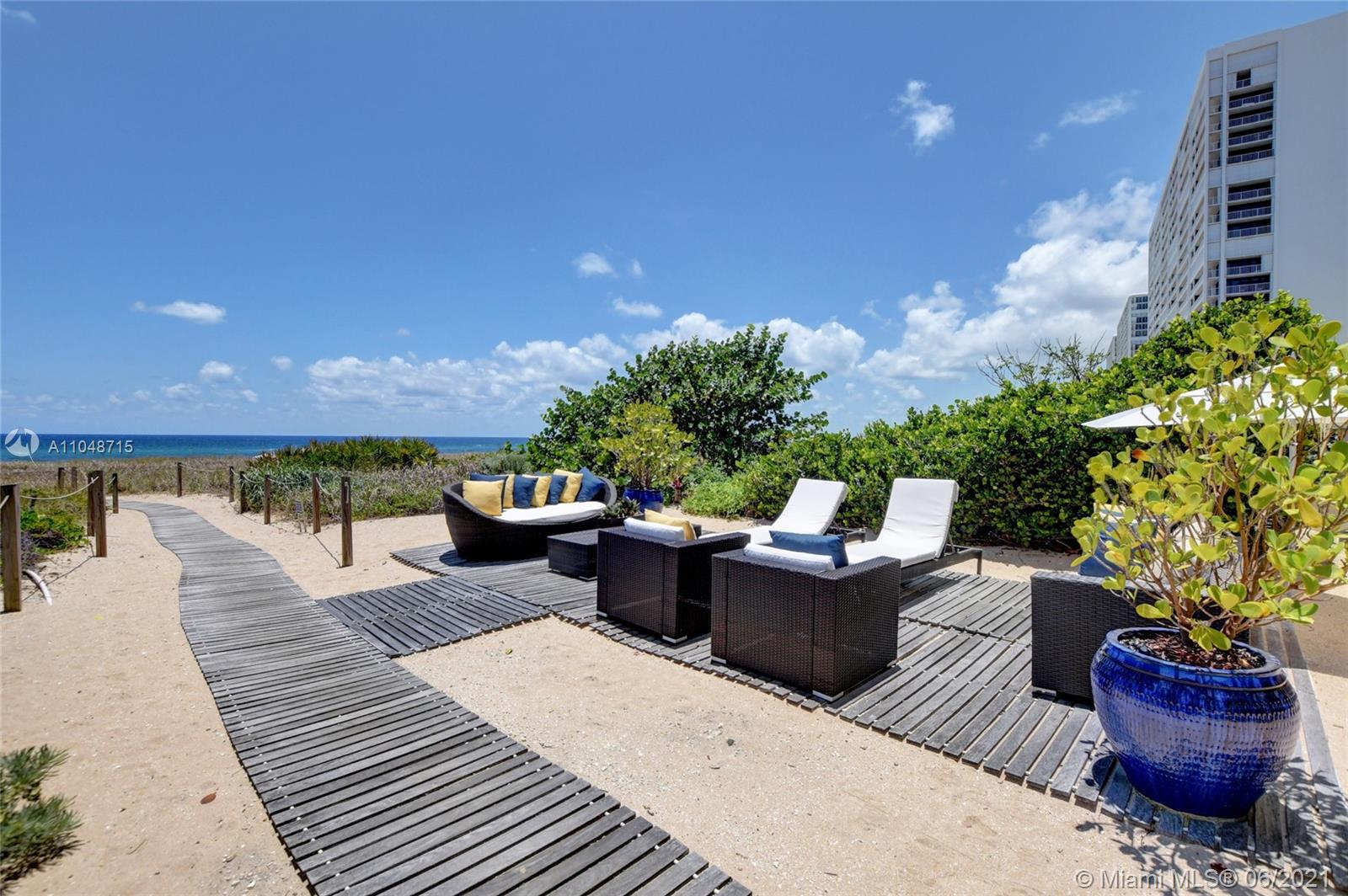 2500 South Ocean Boulevard, Unit 702 Boca Raton, FL 33432 - Photo 58 of 61 a view of a patio with couches and potted plants