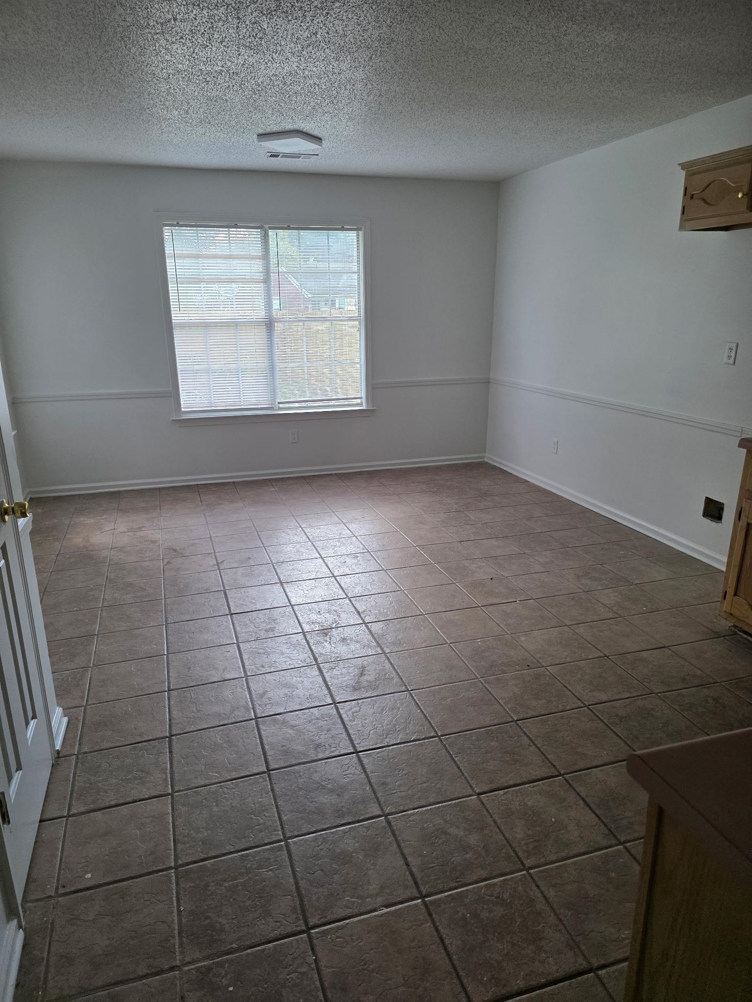 1441 Milestone Drive Collierville, TN 38017 - Photo 13 of 16 a view of empty room with windows