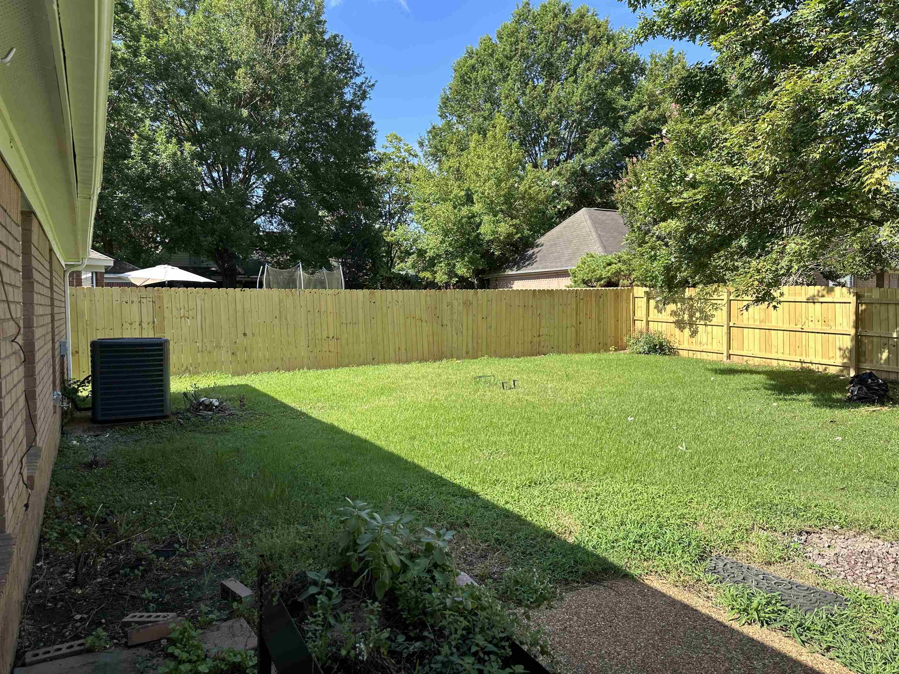 1441 Milestone Drive Collierville, TN 38017 - Photo 15 of 16 a view of a backyard