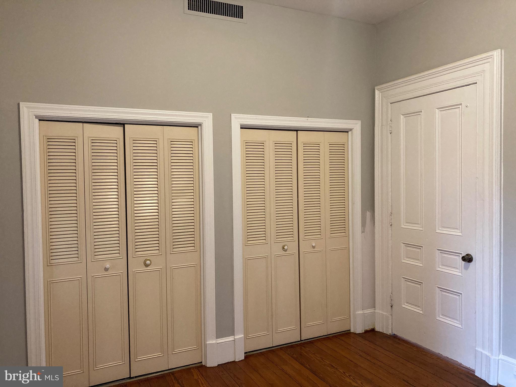 1338 Wisconsin Avenue Northwest, Unit 2 Washington, DC 20007 - Photo 2 of 11 wooden floor in an empty room