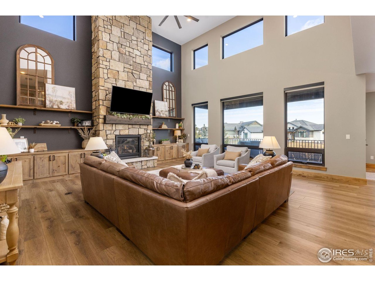 2734 Southwind Road Berthoud, CO 80513 - Photo 11 of 50 Oversized Great Room with 2-Story Stone Fireplace