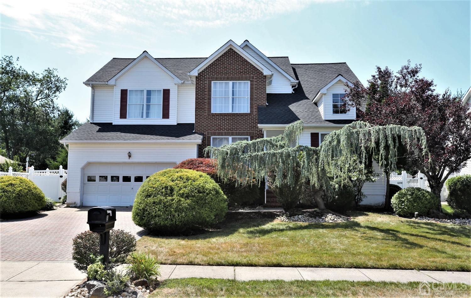 28 Lexington Road Monmouth Junction, NJ 08852 - Photo 1 of 55 a front view of a house with a yard