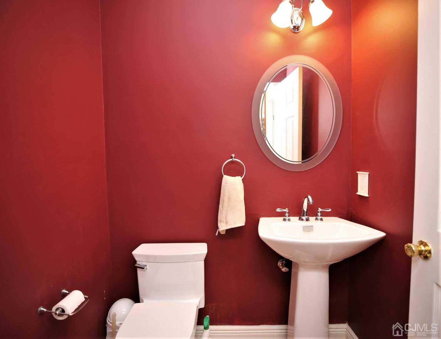 28 Lexington Road Monmouth Junction, NJ 08852 - Photo 25 of 55 a bathroom with a toilet sink and mirror