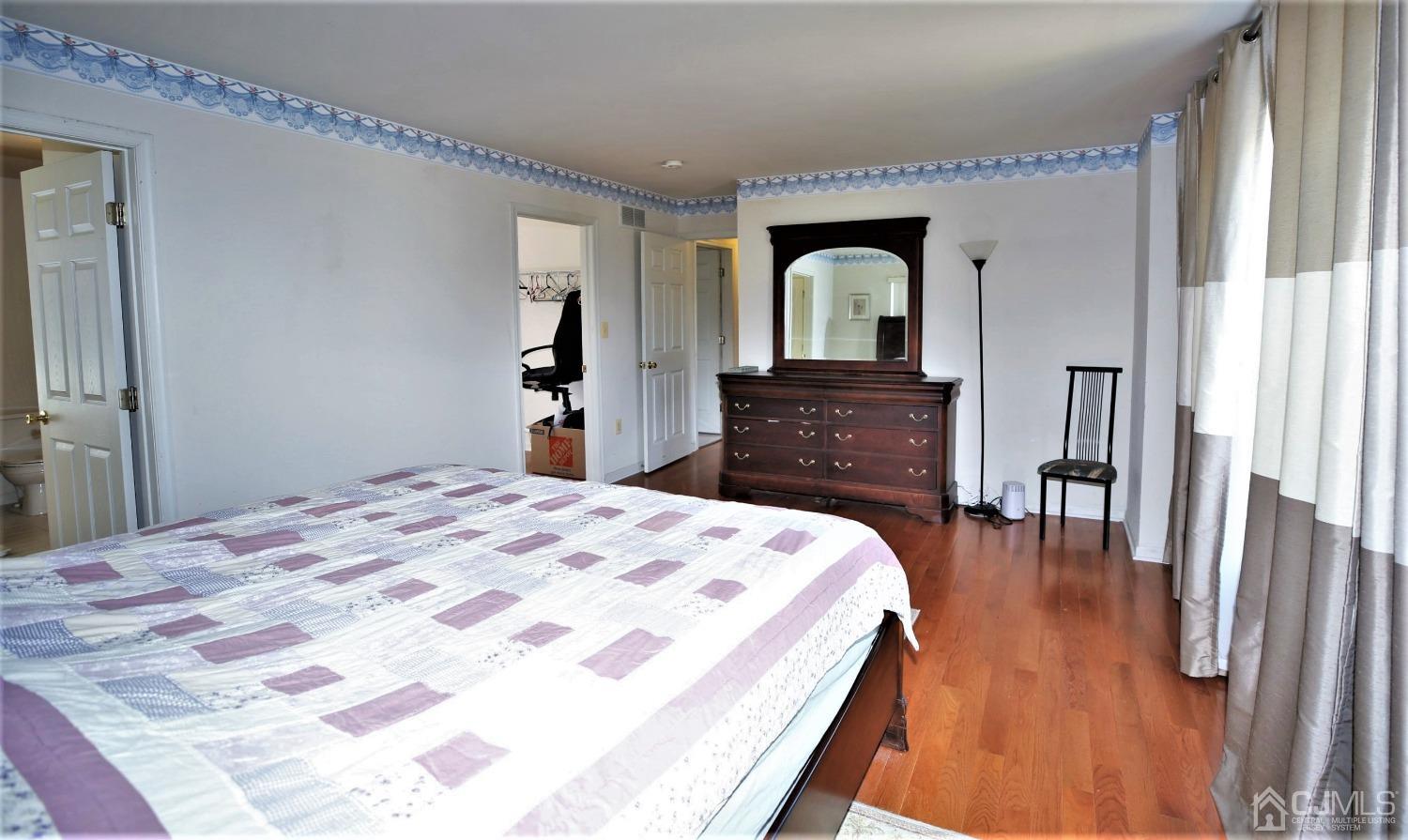 28 Lexington Road Monmouth Junction, NJ 08852 - Photo 30 of 55 a bedroom with a bed and a dresser next to a window