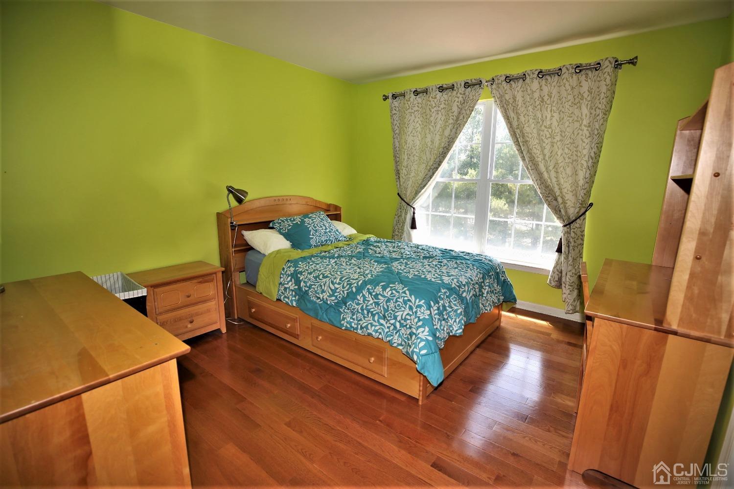 28 Lexington Road Monmouth Junction, NJ 08852 - Photo 38 of 55 a bedroom with a bed and a window