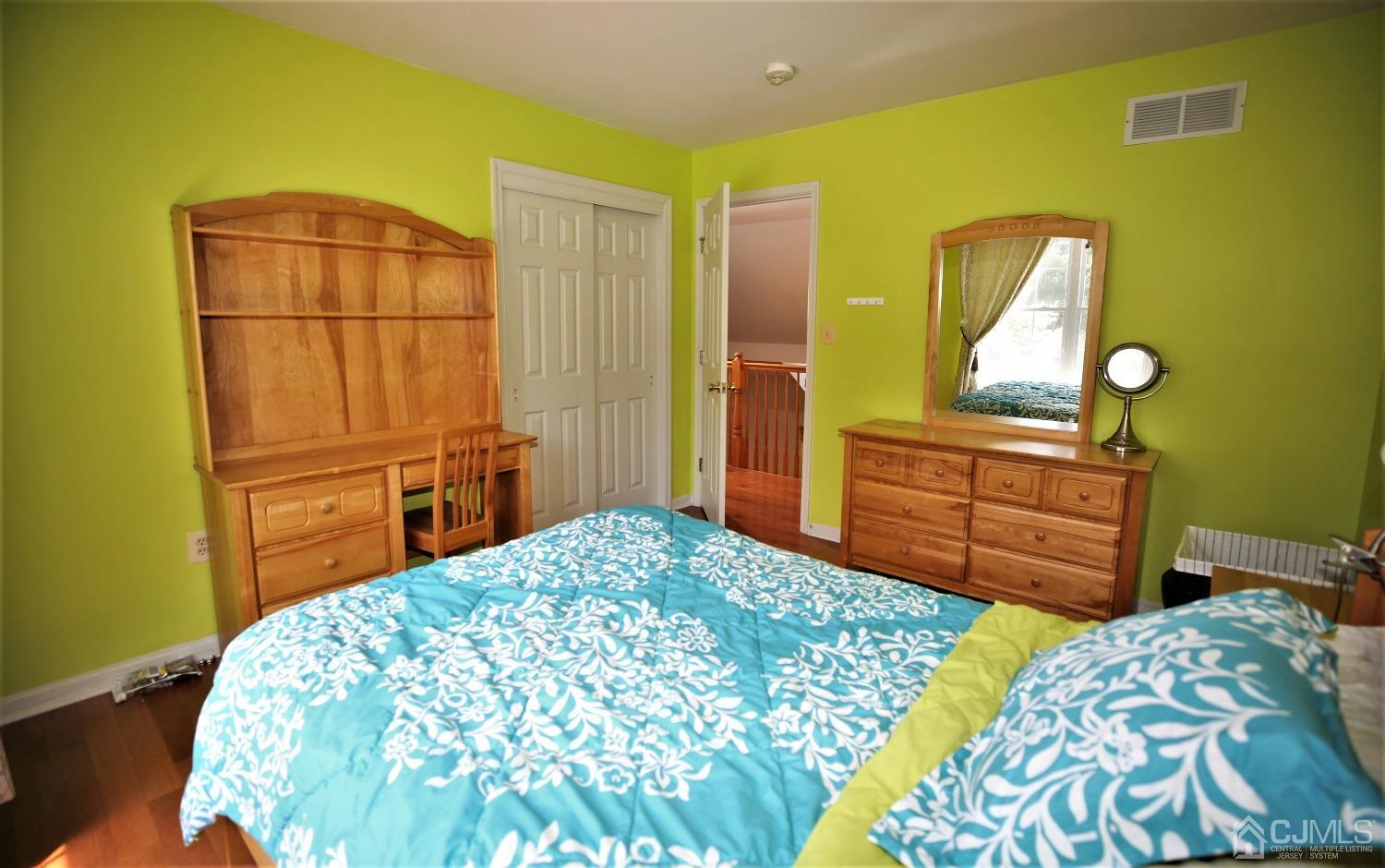 28 Lexington Road Monmouth Junction, NJ 08852 - Photo 39 of 55 a bedroom with a bed and furniture