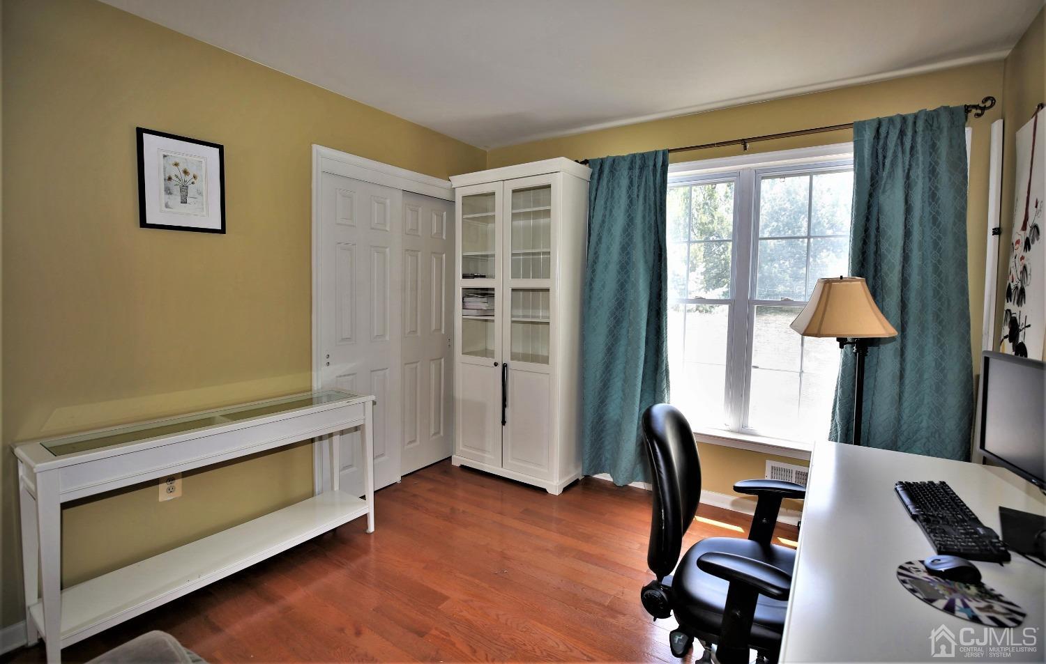 28 Lexington Road Monmouth Junction, NJ 08852 - Photo 41 of 55 a living room with furniture and a window