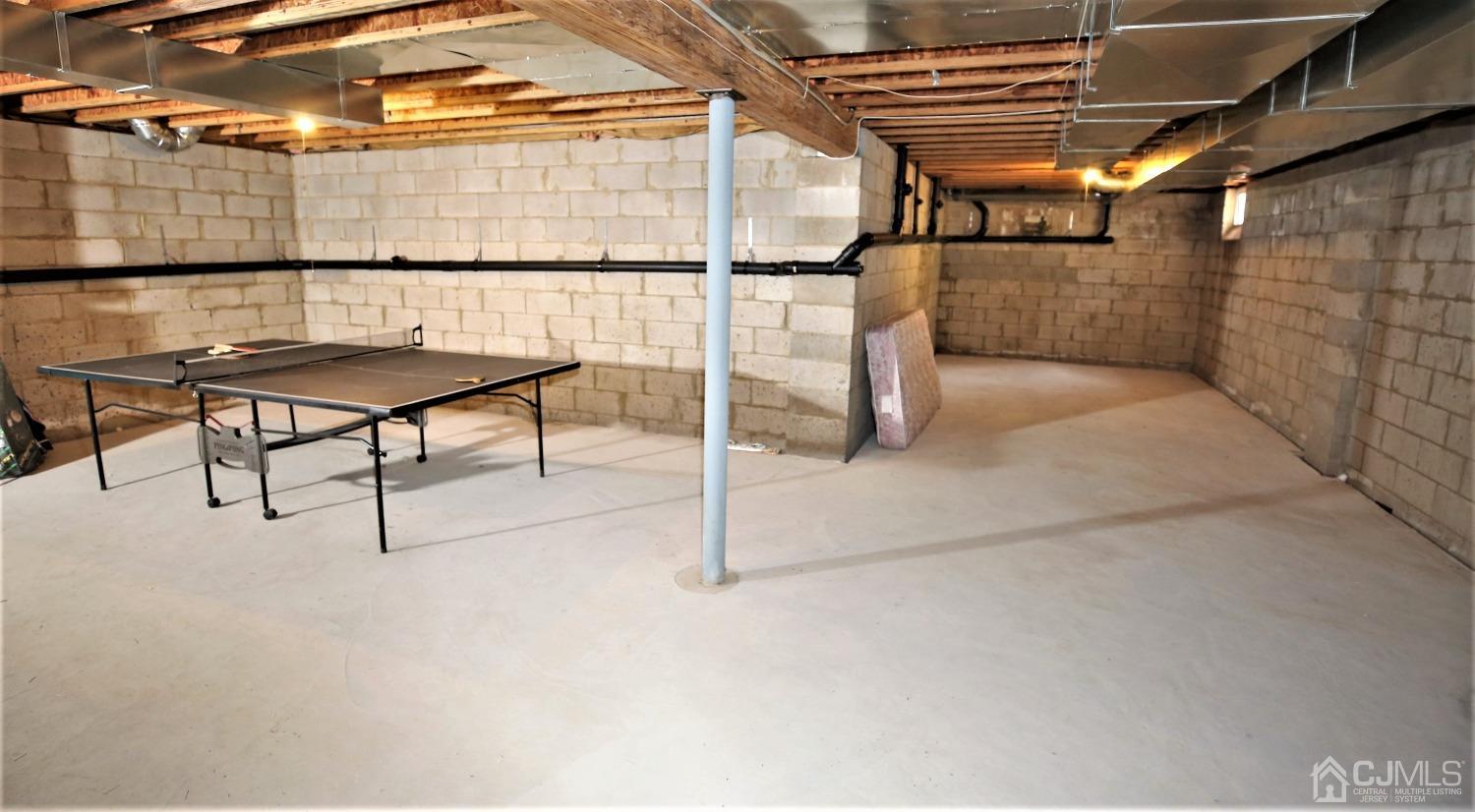 28 Lexington Road Monmouth Junction, NJ 08852 - Photo 43 of 55 a view of a room with racks on the wall