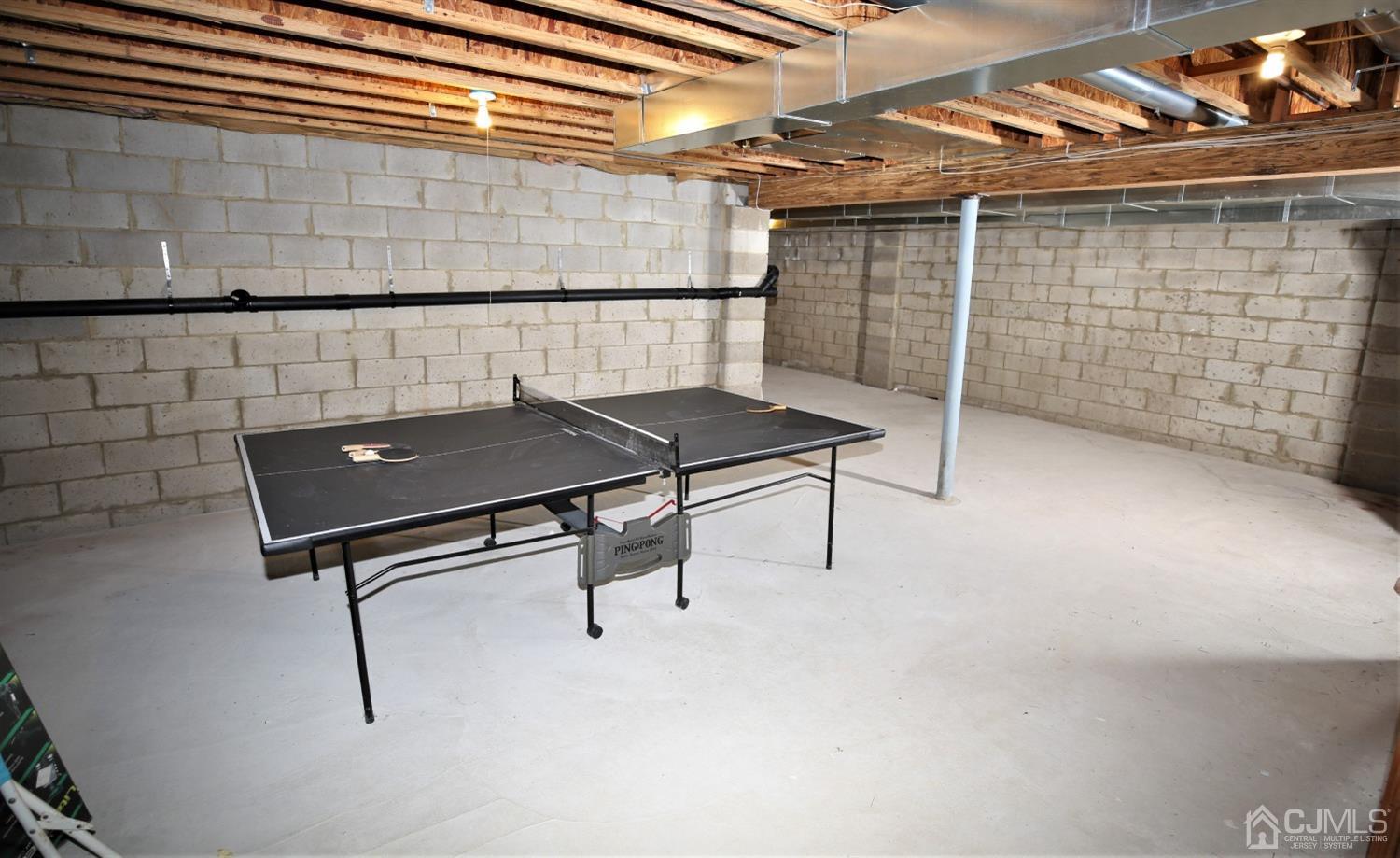 28 Lexington Road Monmouth Junction, NJ 08852 - Photo 44 of 55 a view of a room with racks on the wall