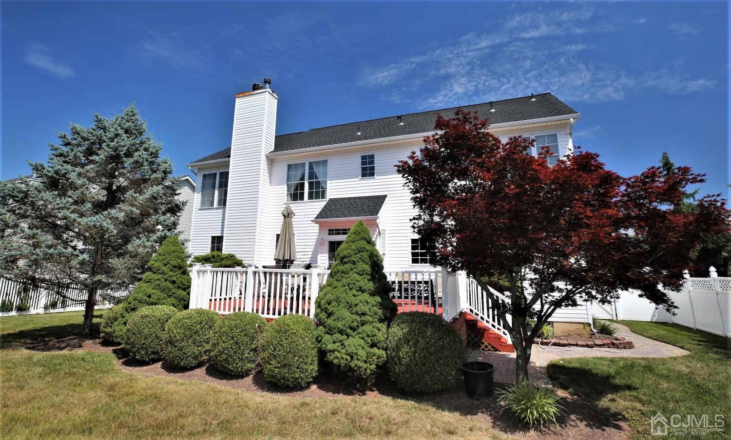28 Lexington Road Monmouth Junction, NJ 08852 - Photo 46 of 55 a front view of a house with a tree