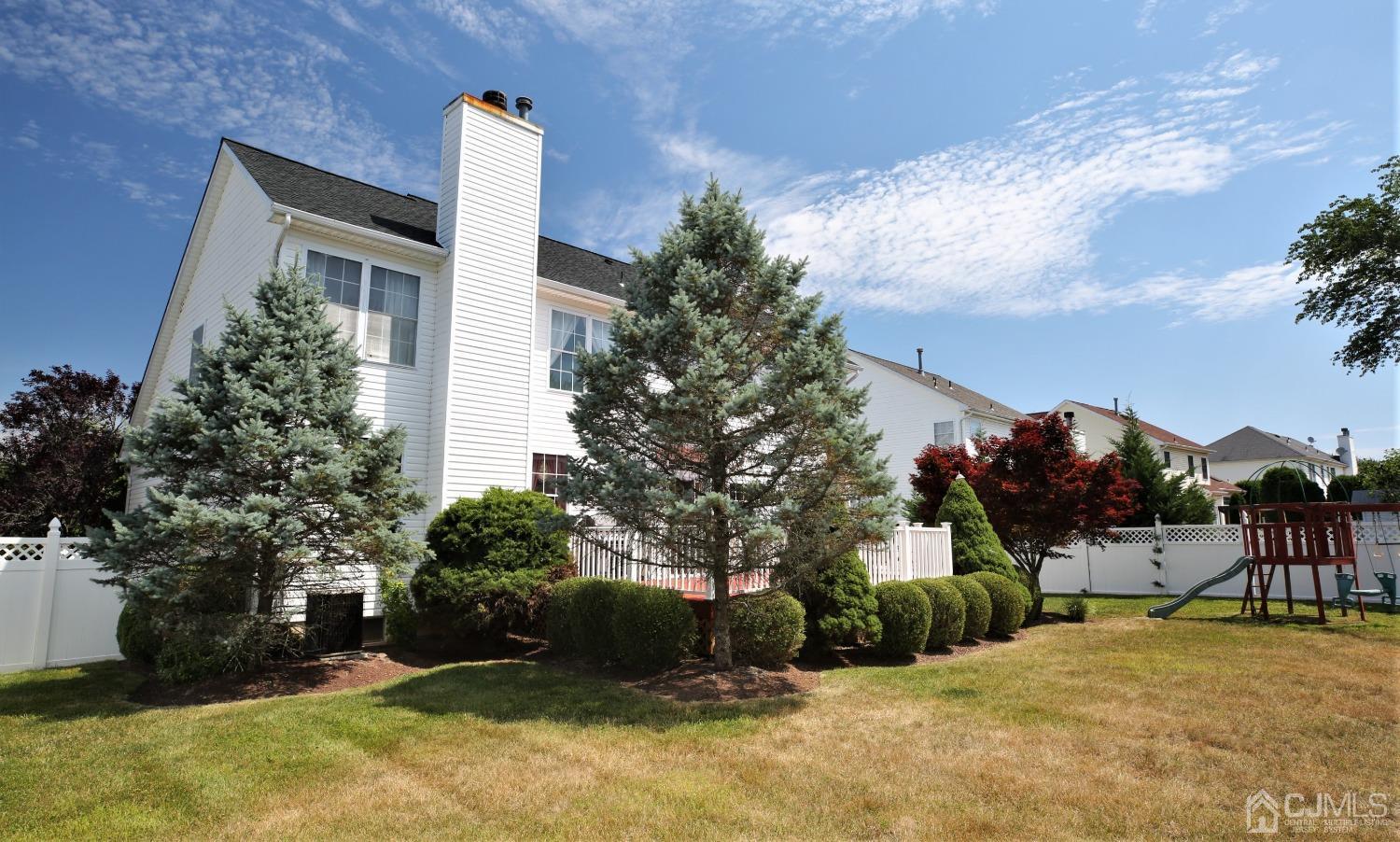 28 Lexington Road Monmouth Junction, NJ 08852 - Photo 48 of 55 a view of a house with a yard