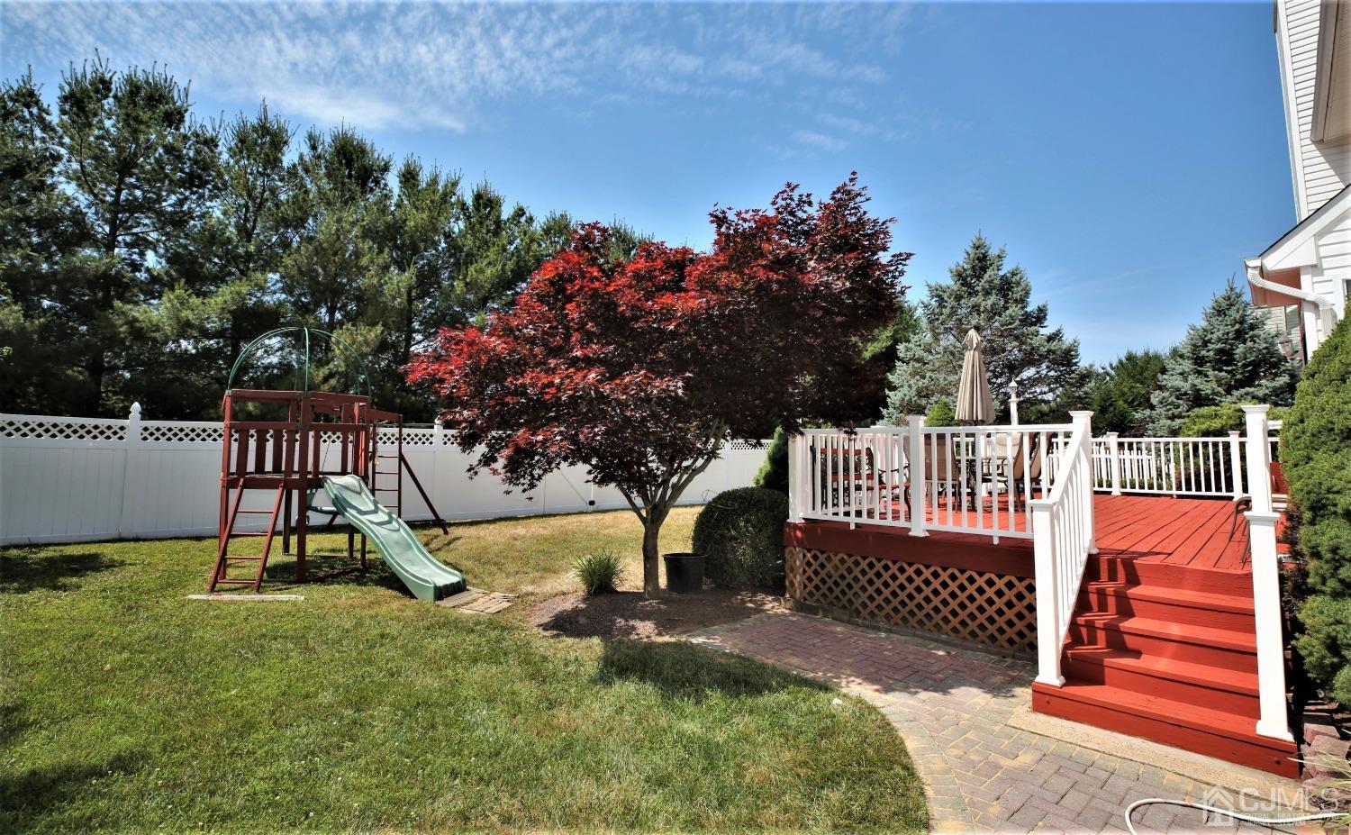 28 Lexington Road Monmouth Junction, NJ 08852 - Photo 49 of 55 a view of a park with a slide