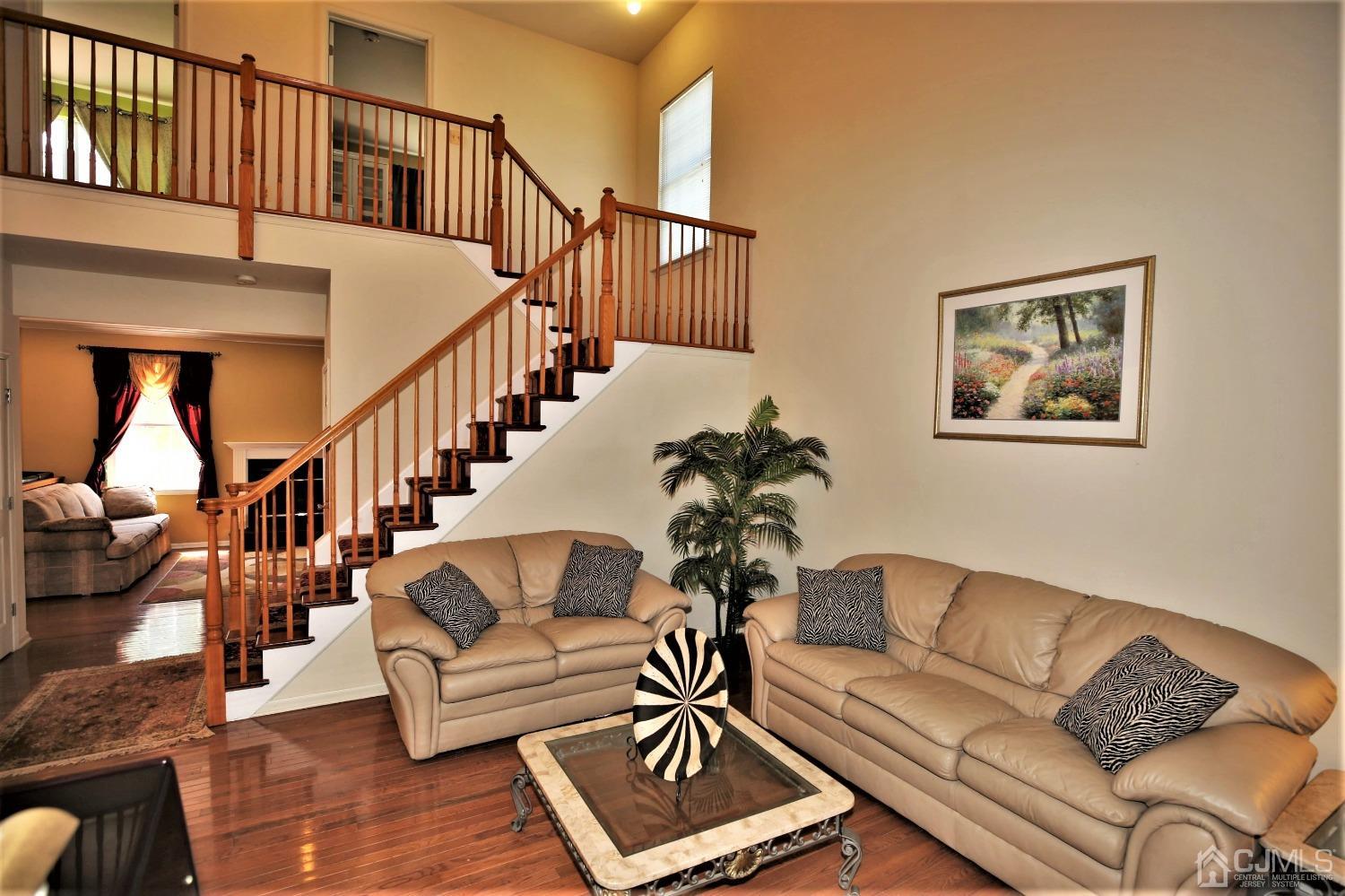 28 Lexington Road Monmouth Junction, NJ 08852 - Photo 6 of 55 a living room with furniture
