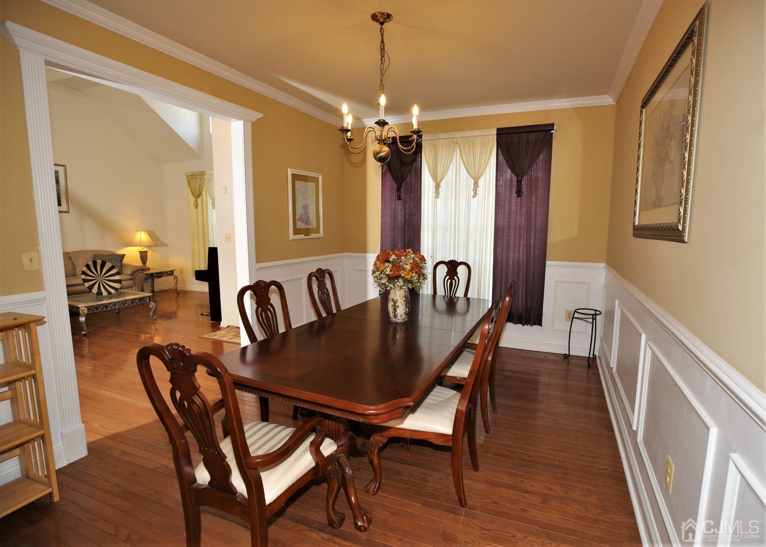 28 Lexington Road Monmouth Junction, NJ 08852 - Photo 9 of 55 a view of a a dining room with furniture window and wooden floor