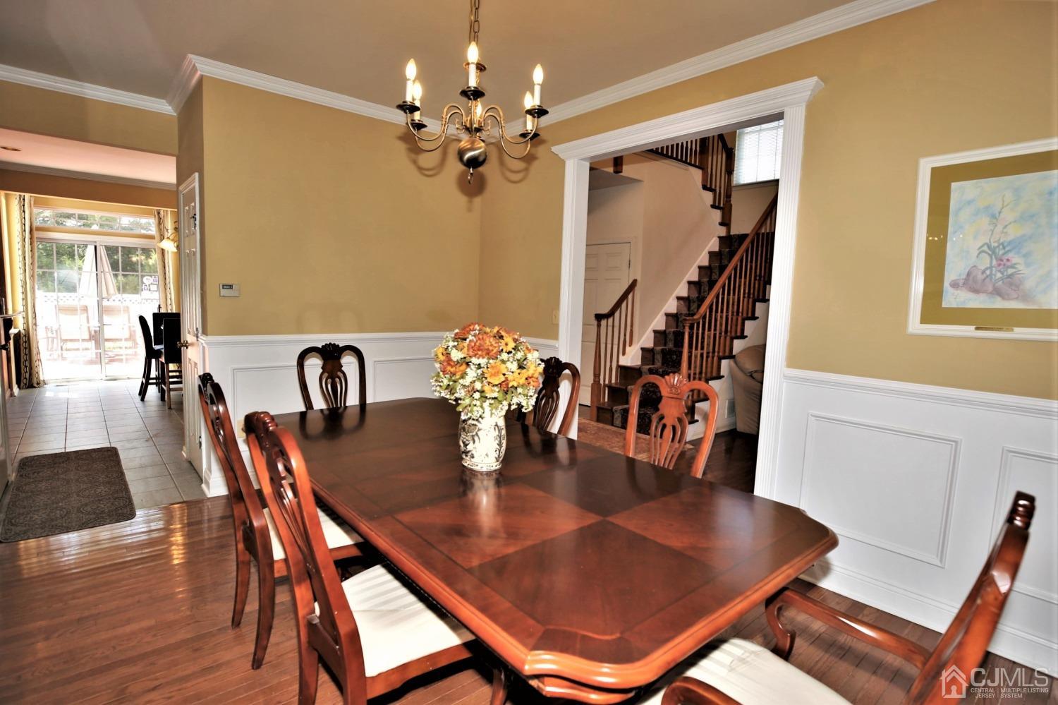 28 Lexington Road Monmouth Junction, NJ 08852 - Photo 10 of 55 a dining room with furniture and wooden floor