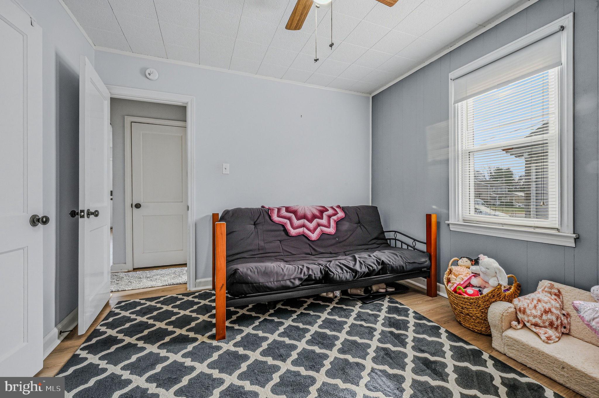 4906 Shepherd Street Brookhaven, PA 19015 - Photo 11 of 29 a living room with furniture and a window