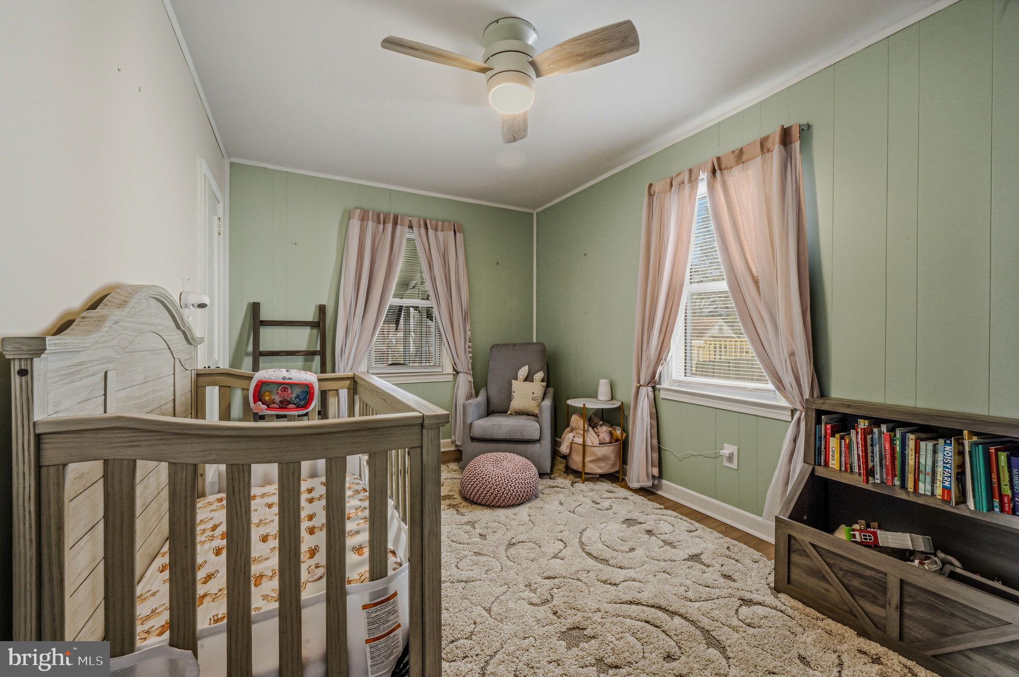 4906 Shepherd Street Brookhaven, PA 19015 - Photo 12 of 29 a bedroom with furniture and a window