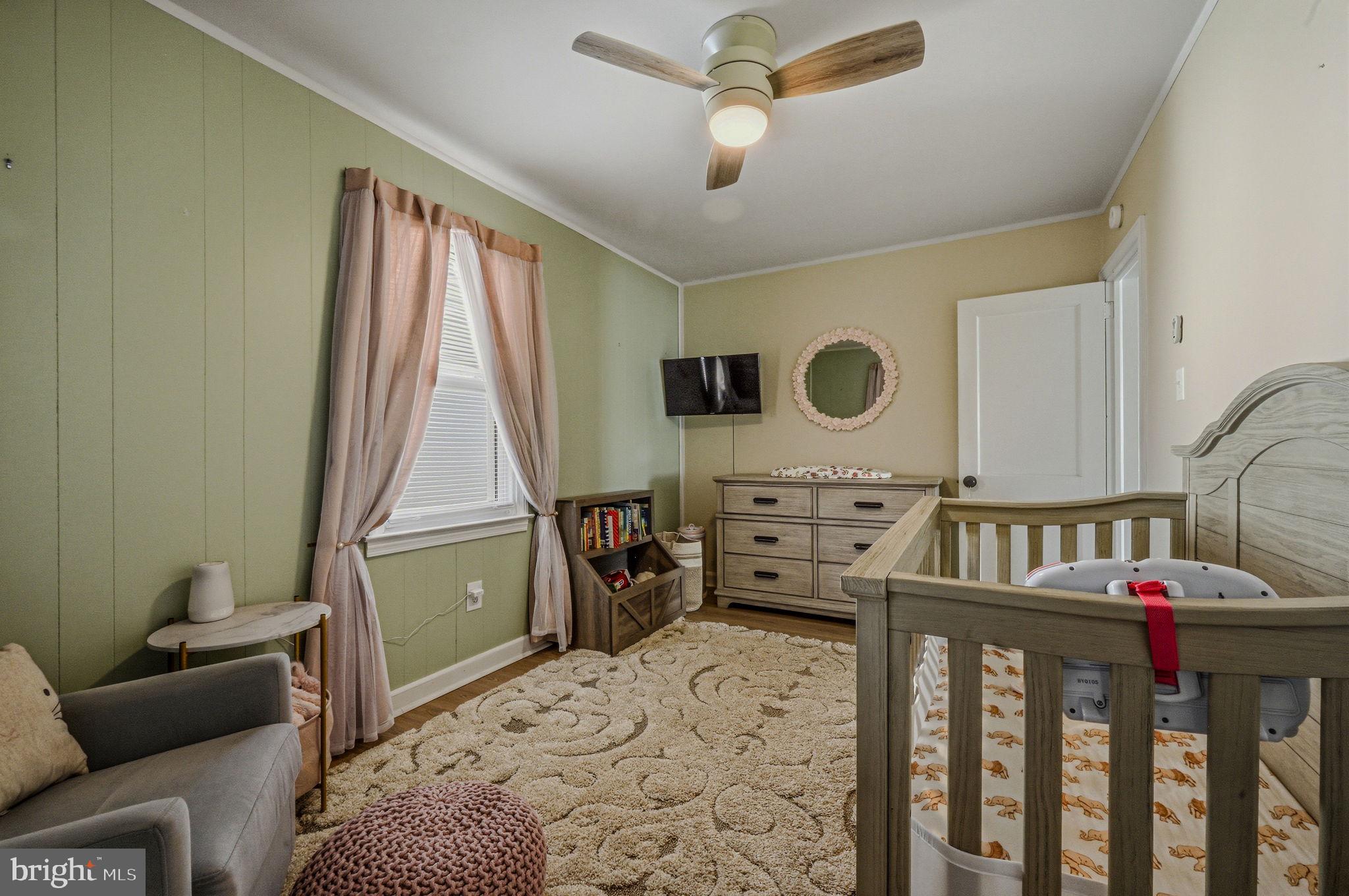 4906 Shepherd Street Brookhaven, PA 19015 - Photo 13 of 29 a bedroom with furniture and a window