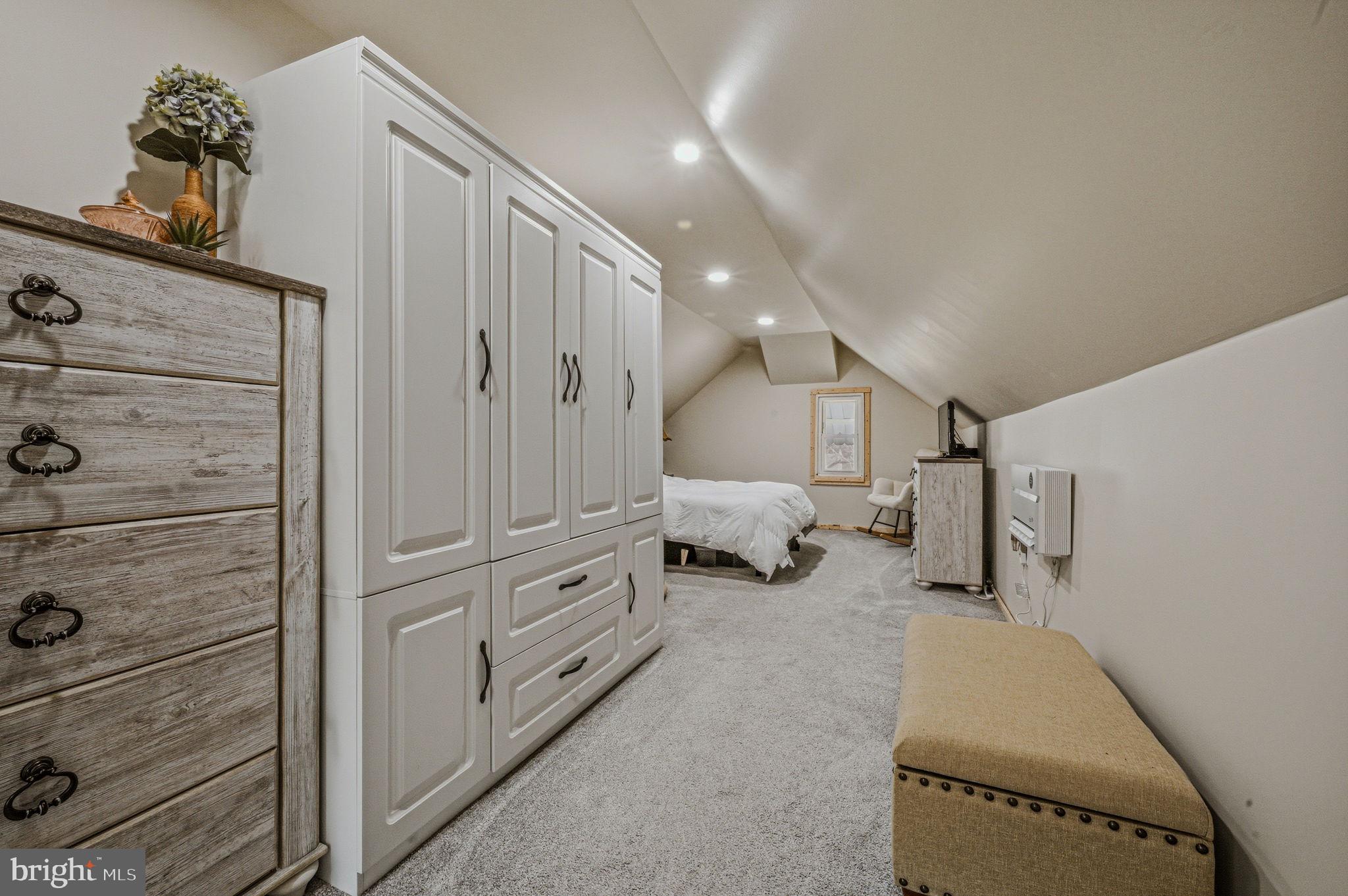 4906 Shepherd Street Brookhaven, PA 19015 - Photo 15 of 29 a spacious bedroom with a bed and a dresser