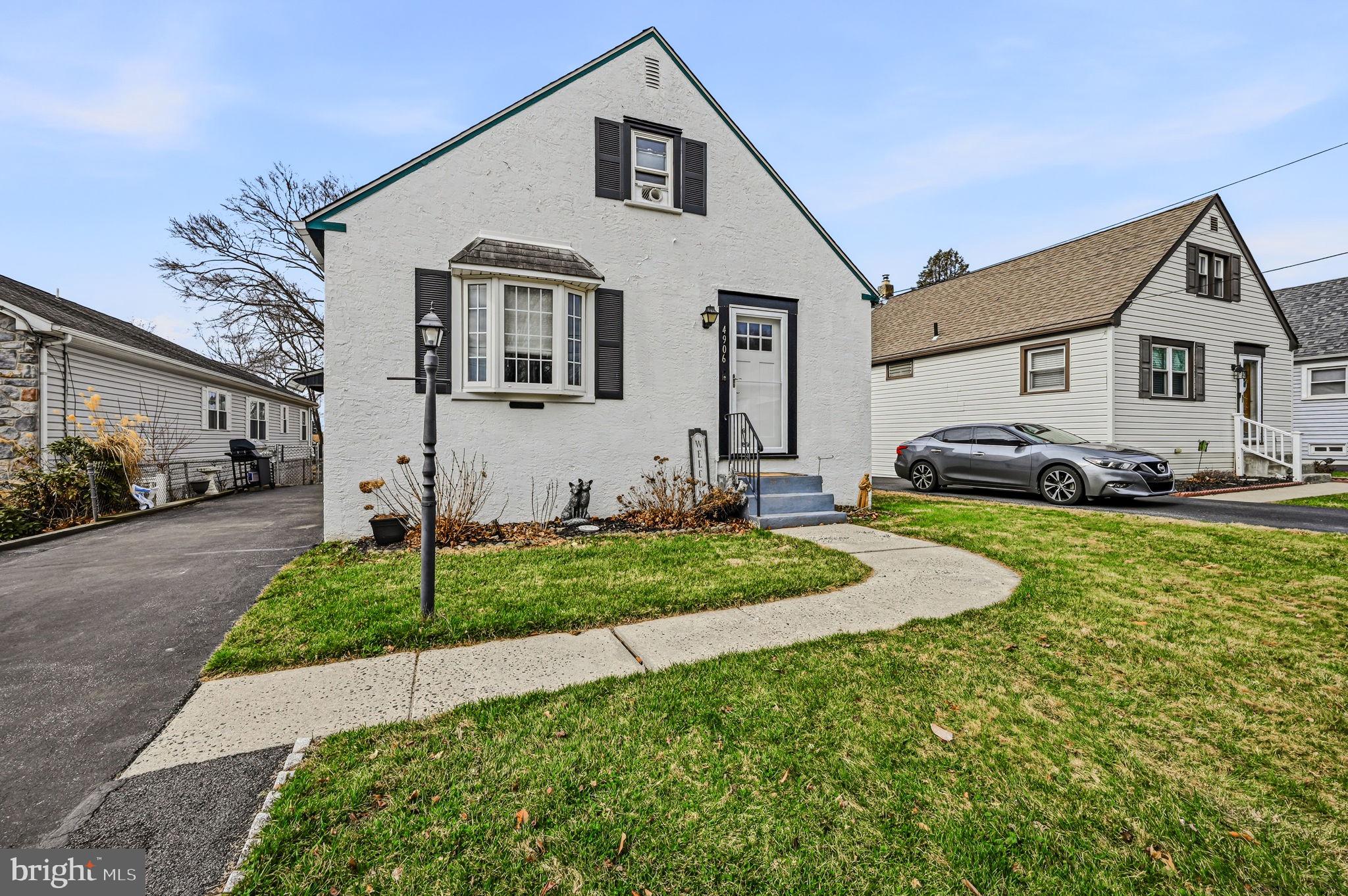 4906 Shepherd Street Brookhaven, PA 19015 - Photo 2 of 29 a front view of a house with a yard
