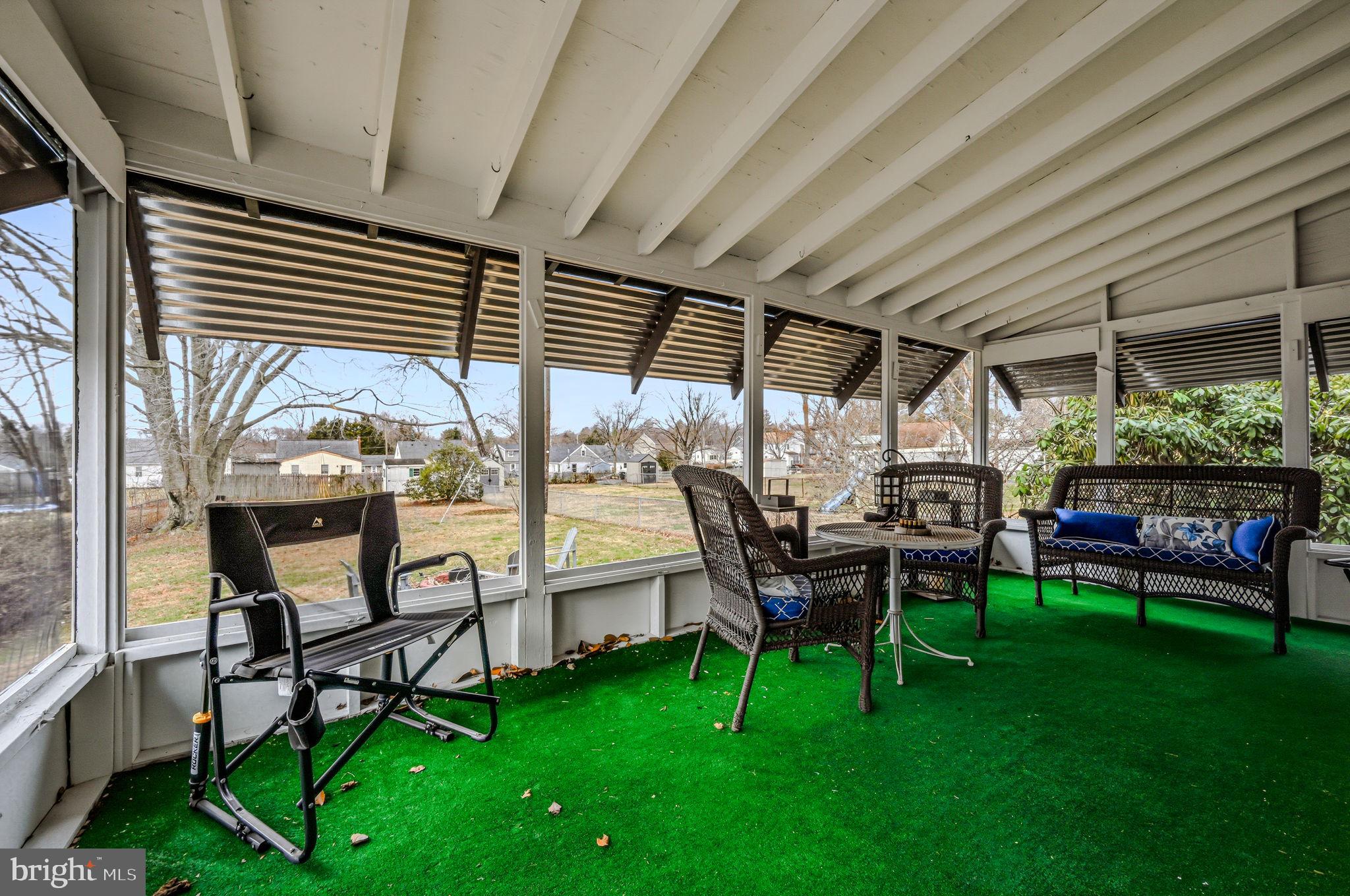 4906 Shepherd Street Brookhaven, PA 19015 - Photo 23 of 29 a patio with table and chairs