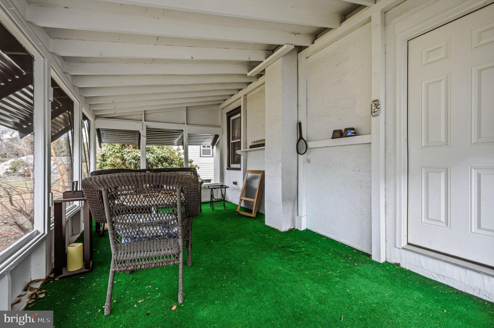 4906 Shepherd Street Brookhaven, PA 19015 - Photo 24 of 29 a view of a porch with furniture and a yard