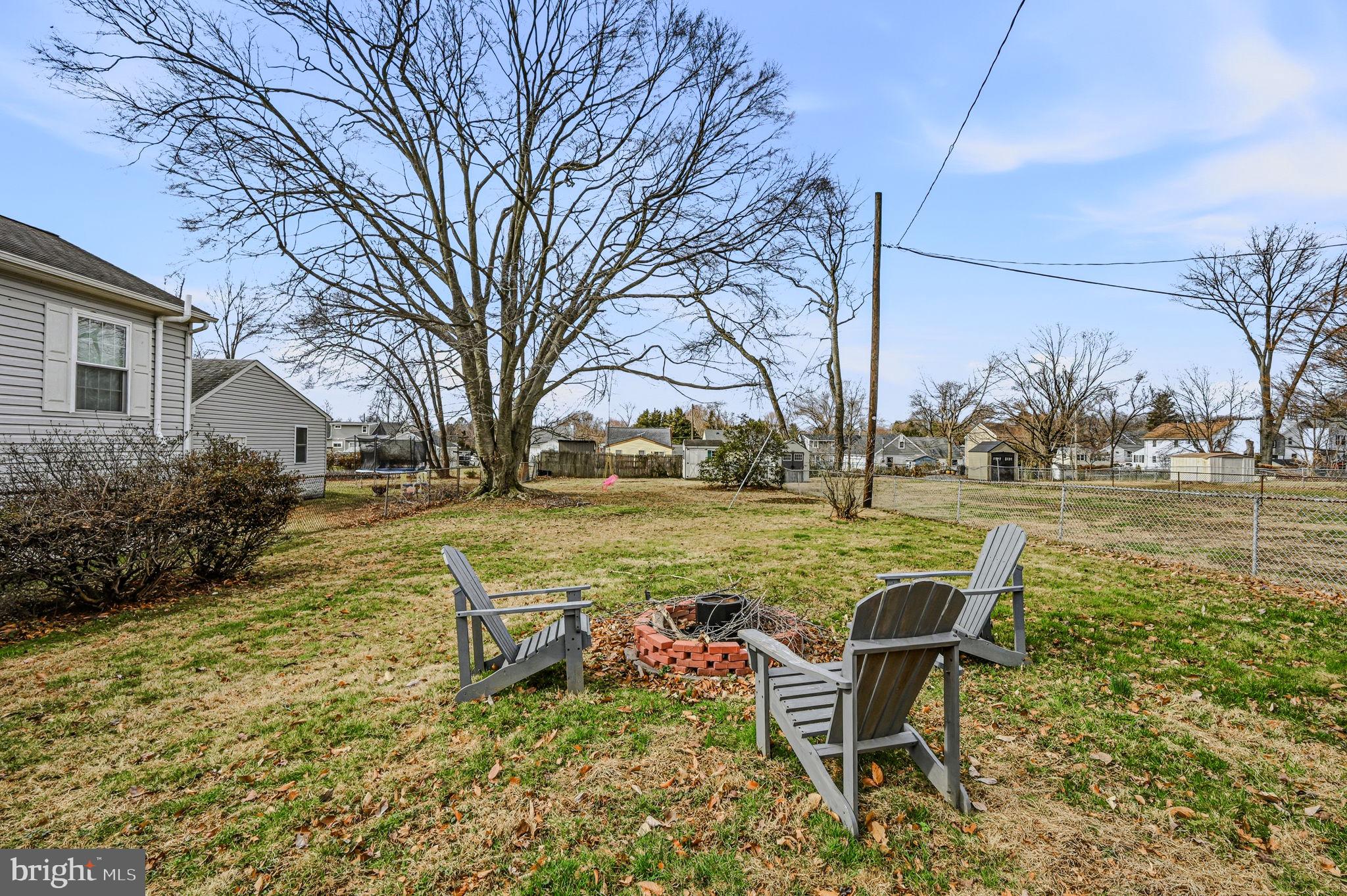 4906 Shepherd Street Brookhaven, PA 19015 - Photo 26 of 29 a swimming pool with outdoor seating and yard