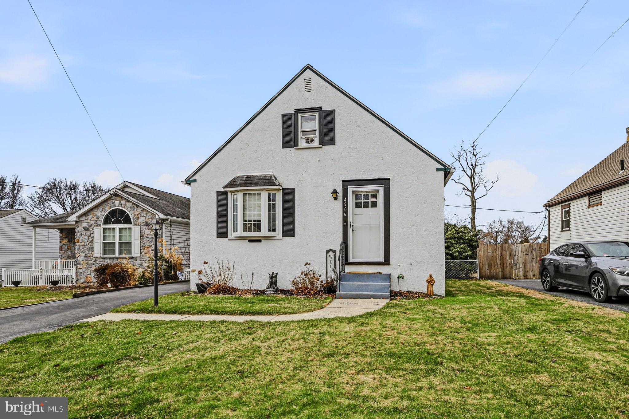 4906 Shepherd Street Brookhaven, PA 19015 - Photo 29 of 29 a front view of a house with a yard