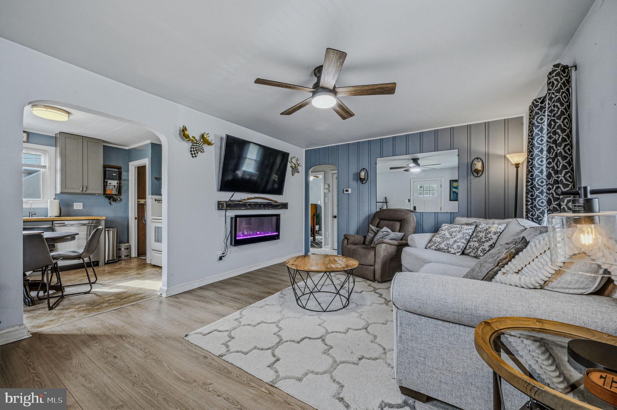 4906 Shepherd Street Brookhaven, PA 19015 - Photo 5 of 29 a living room with furniture and a flat screen tv