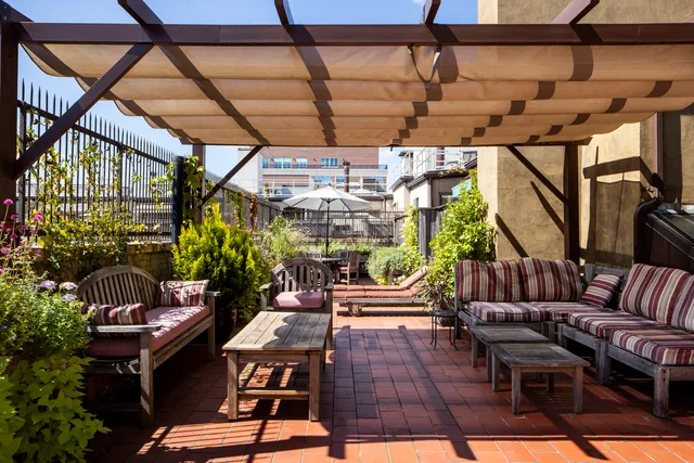 a garden view with a seating space