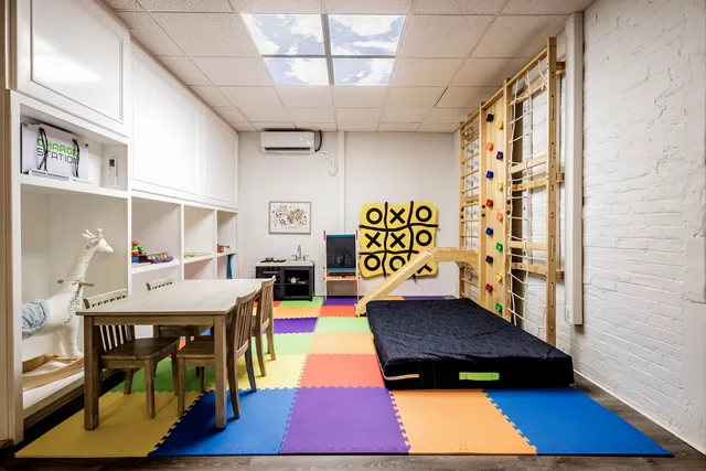 a view of a room with gym equipment