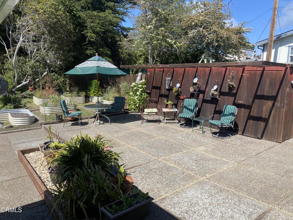 31400 Sherwood Road Fort Bragg, CA 95437 - Photo 43 of 55 an outdoor space with patio and white umbrellas