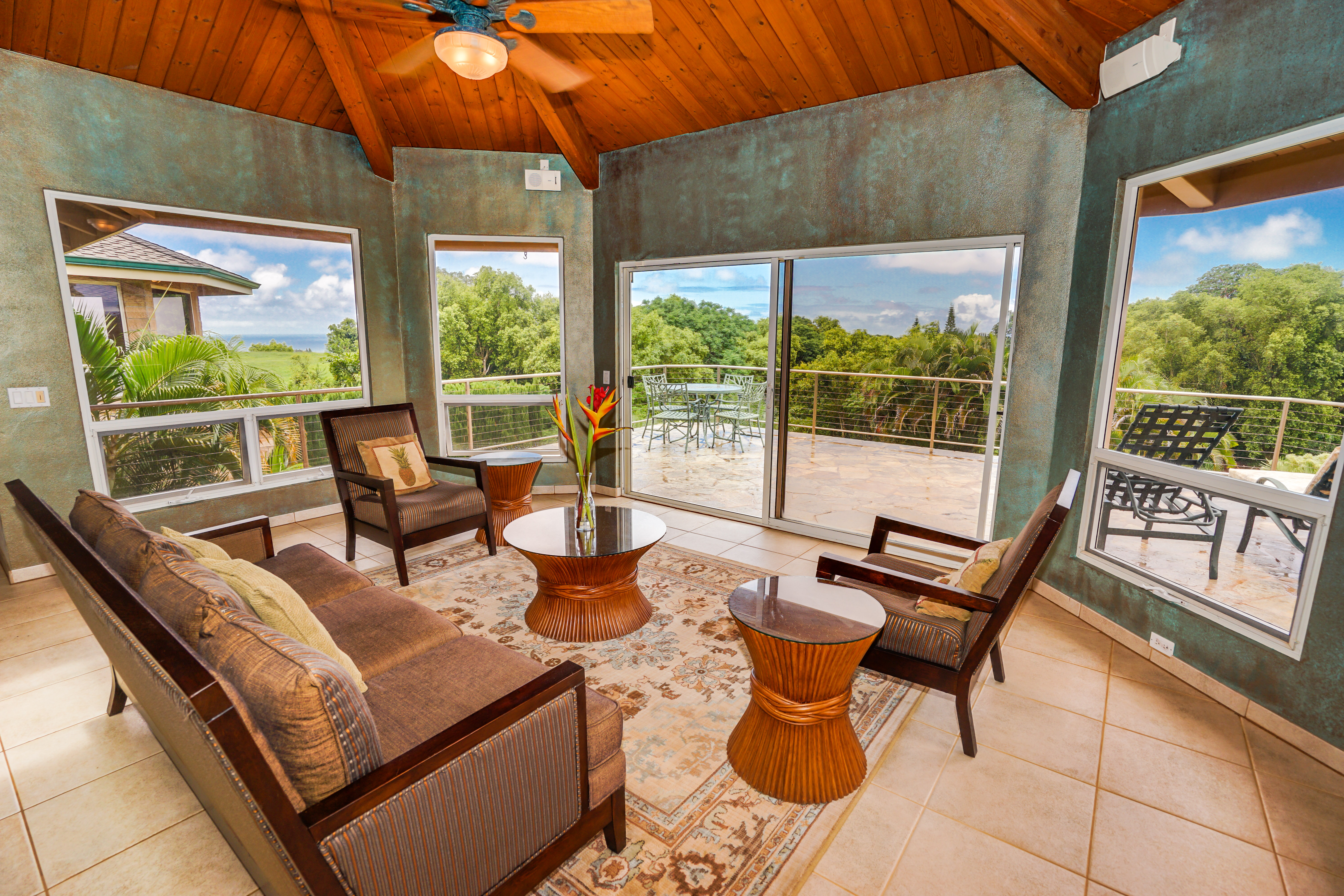 4700 Kapuna Road Kilauea, HI 96754 - Photo 5 of 17 a building outdoor space with patio furniture