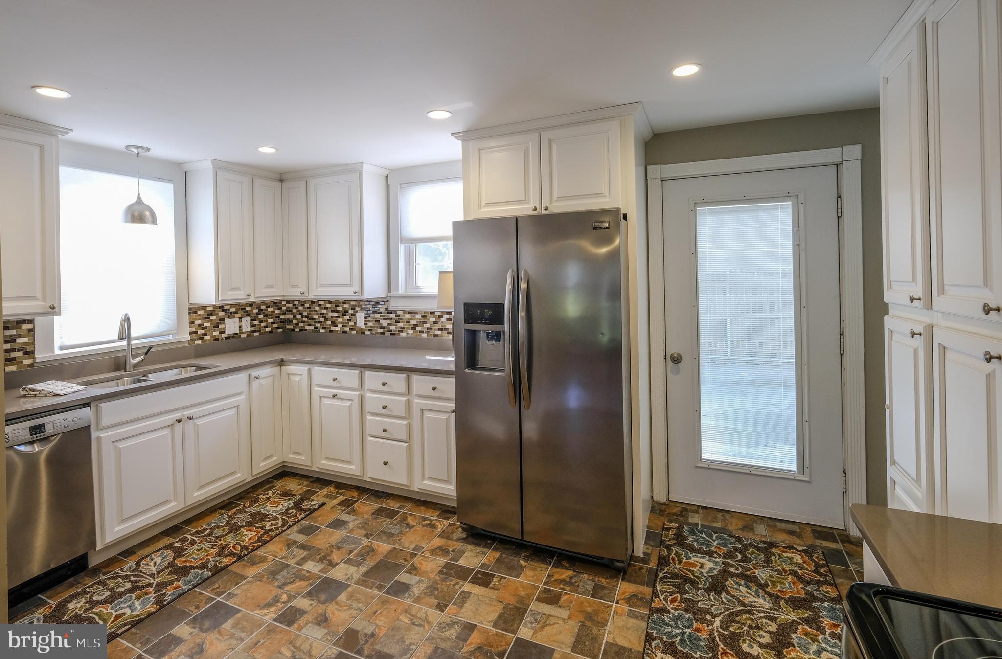 1538 Senseny Road Winchester, VA 22602 - Photo 4 of 23 All new SS appliances, quartz counters, tile flrs.
