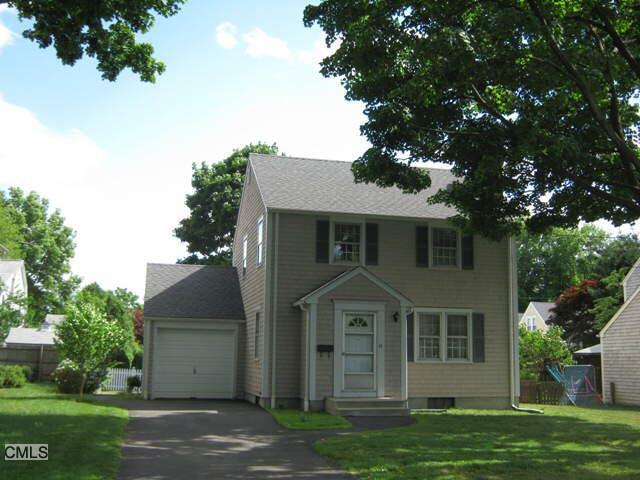 41 Northfield Road Fairfield, CT 06824 - Photo 1 of 1 front view of a house with a yard