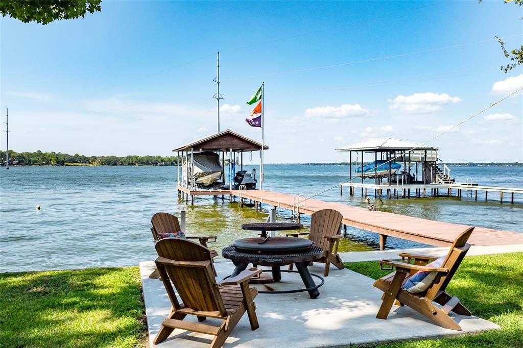 309 Shore Line Drive Tool, TX 75143 - Photo 21 of 23 a view of a lake from a chairs and table in the terrace
