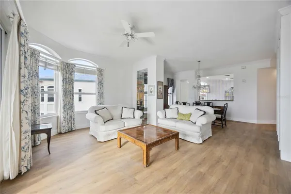 a living room with furniture and a table