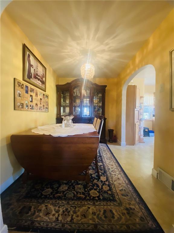 16 Coates Avenue New Castle, PA 16101 - Photo 9 of 23 a bed sitting in a bedroom next to a larger window