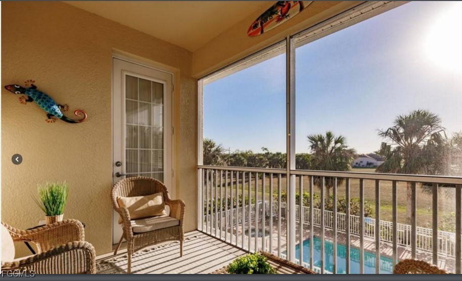 16572 San Edmundo Road, Unit 122 Punta Gorda, FL 33955 - Photo 17 of 23 a view of balcony with couch