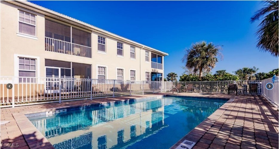 16572 San Edmundo Road, Unit 122 Punta Gorda, FL 33955 - Photo 22 of 23 a view of a building with lake view