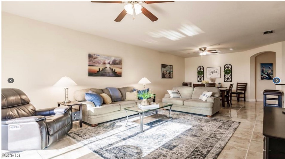 16572 San Edmundo Road, Unit 122 Punta Gorda, FL 33955 - Photo 6 of 23 a living room with furniture and view of kitchen