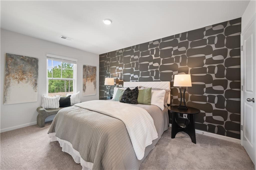 9435 Maple Grv Lane, Unit 97 Jonesboro, GA 30238 - Photo 12 of 17 a bedroom with a bed and a window