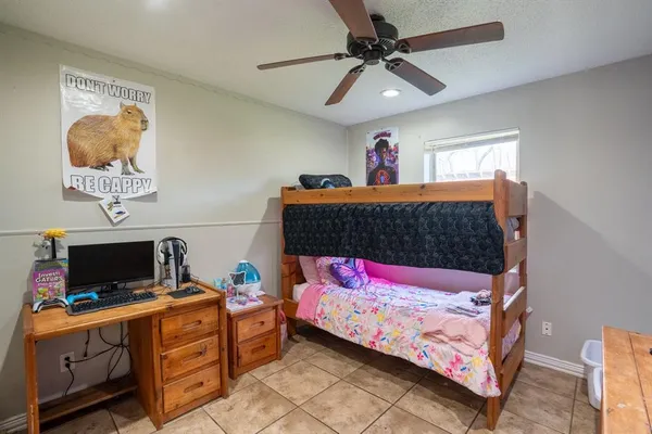 a bedroom with a bed and furniture