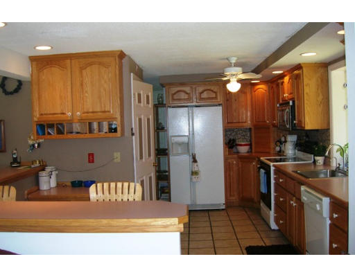 45 Brooks Village Road Phillipston, MA 01331 - Photo 6 of 12 a kitchen with stainless steel appliances granite countertop a refrigerator and a stove