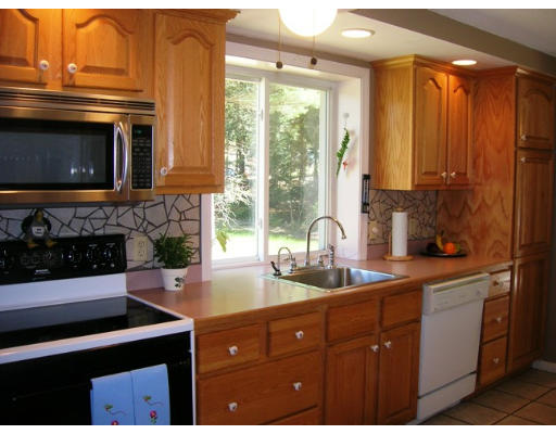 45 Brooks Village Road Phillipston, MA 01331 - Photo 7 of 12 a kitchen with a sink a counter space and cabinets